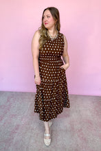 Load image into Gallery viewer, Girl in a brown polka dot midi dress with a pink backdrop