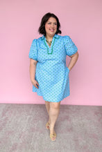 Load image into Gallery viewer, Woman wearing a light blue dress with a pink background
