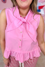 Load image into Gallery viewer, Person wearing a pink sleeveless top with a bow and ruffled hem, paired with red and white checkered pants.