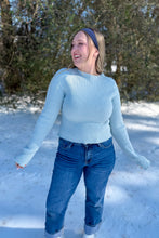Load image into Gallery viewer, Icy Blue Bell Sleeve Ribbed Knit Mockneck Top close up view with arms out 
