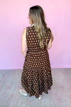 Load image into Gallery viewer, Girl in a brown polka dot midi dress with a pink backdrop
