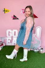 Load image into Gallery viewer, Denim Romper with pockets and front tie  side view
