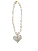Load image into Gallery viewer, Resin necklace with a heart-shaped pendant on a white background
