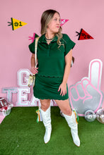 Load image into Gallery viewer, Hunter Green Entro Scalloped Skirt Set top with buttons front view with stadium bag
