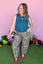 Load image into Gallery viewer, Girl wearing denim top and leopard barrel jeans with red jelly shoes. 
