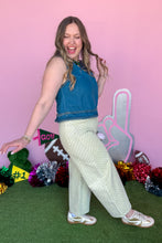 Load image into Gallery viewer, Girl wearing denim top and green polka dot barrel jeans.
