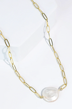 Load image into Gallery viewer, Gold chain necklace with a  pearl pendant on a white background
